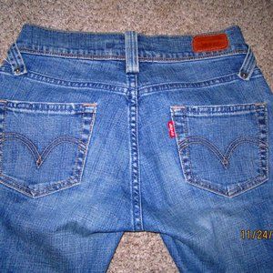 Red Tag Levi’s Stretch Straight Leg, length is 31”